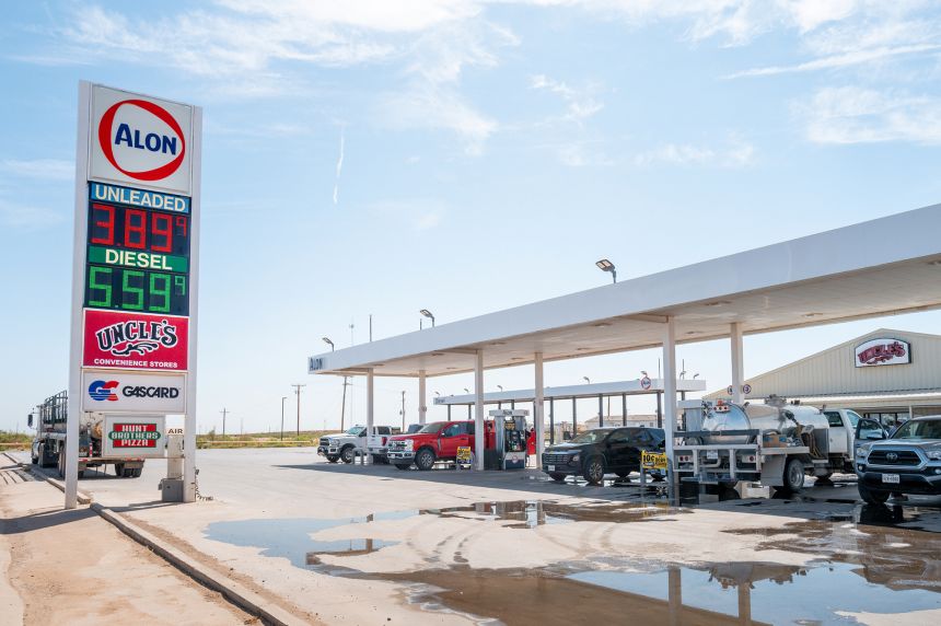 Gas and diesel prices are displayed at an Alon gas station in Pecos, Texas, on August 13.