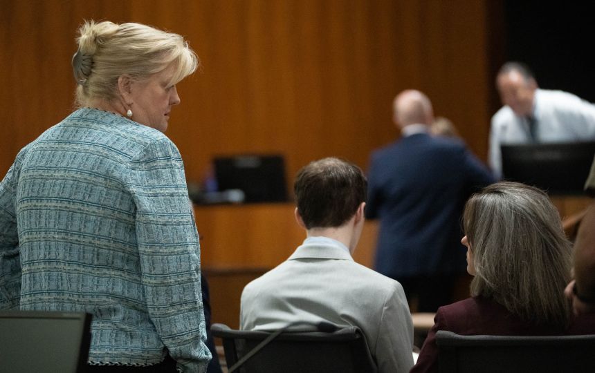 Tyler Robinson, charged in the fatal shooting of Charlie Kirk, sits to the left of defense attorney Staci Visser and in front of defense attorney Kathryn Nester during a preliminary hearing Tuesday in Provo, Utah.