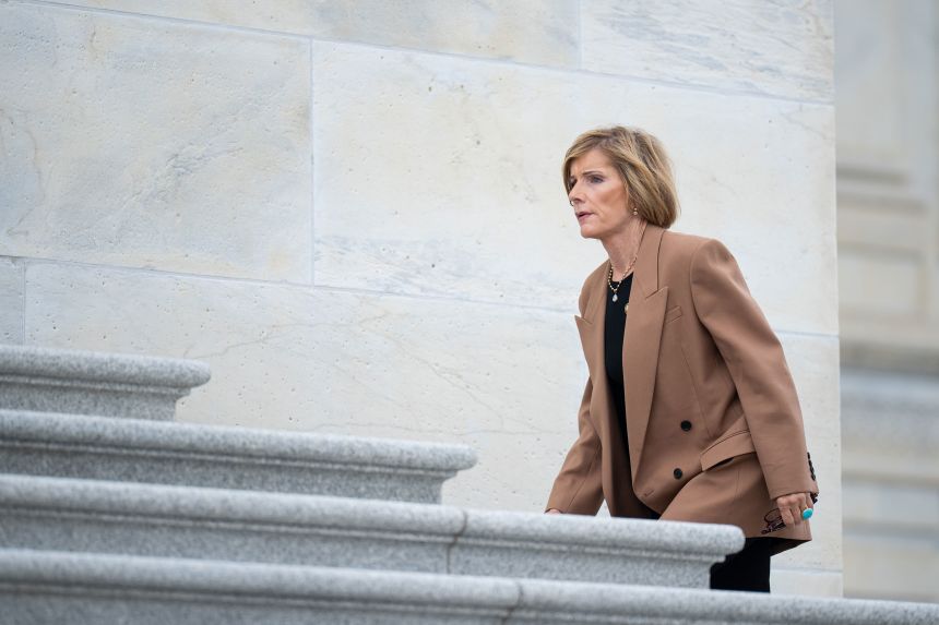 Rep. Susie Lee walks up the House steps on September 3.