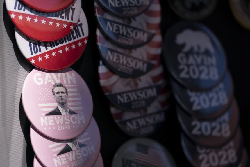 Buttons featuring potential 2028 presidential candidate and California Gov. Gavin Newsom before an event at the Penn Center on September 3, 2026 on St. Helena Island, South Carolina.