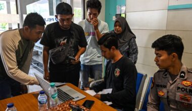 Search underway for 130 people after Indonesian passenger ship carrying more than 240 people overturns
