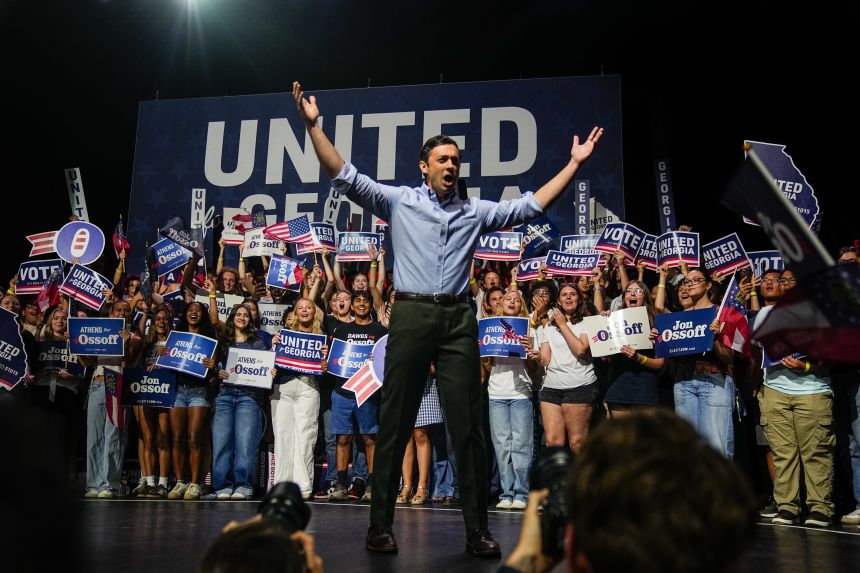 US Senator Jon Ossoff greets supporters during a campaign event at the Georgia Theater in Athens, Georgia, on September 13.