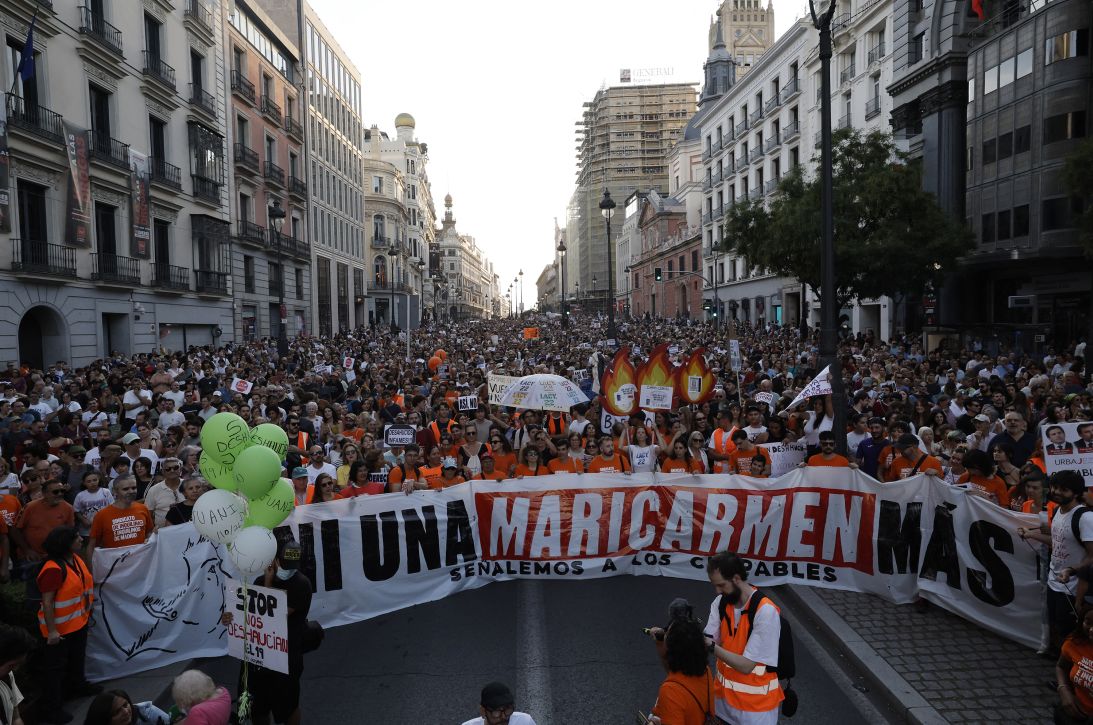 Demonstrators protest against evictions and the housing crisis in Madrid, on September 26. The banner reads 'Not a single more Maricarmen' in a reference to an 87-year-old evicted from her Madrid home.