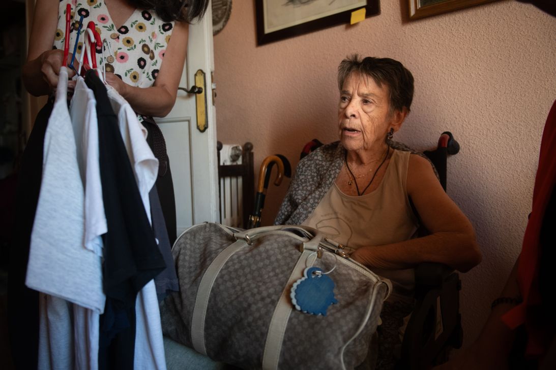 Maricarmen packs a bag with her belongings before being evicted from her home in Madrid, Spain, on September 23.
