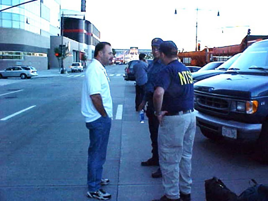 Grosof, right, is seen near the FBI makeshift office in New York in 2001.