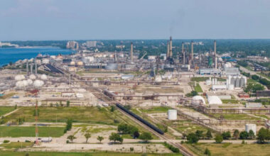 Oil edges down as investors weigh uncertainty over U.S.-Iran strikes