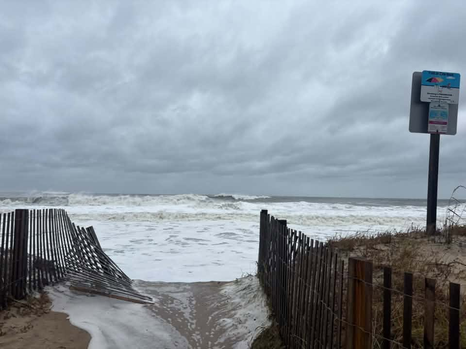 Ocean water breaching the dunes in Ocean City, Maryland on Saturday.