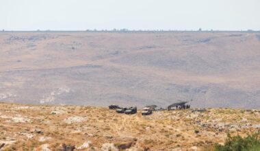 Elements of the Israeli military camp with armored vehicles along the strategic connecting road between the villages of Jamla and Saysoun in the western countryside of the Daraa Governorate in southern Syria on June 28, 2026. (AA Photo)