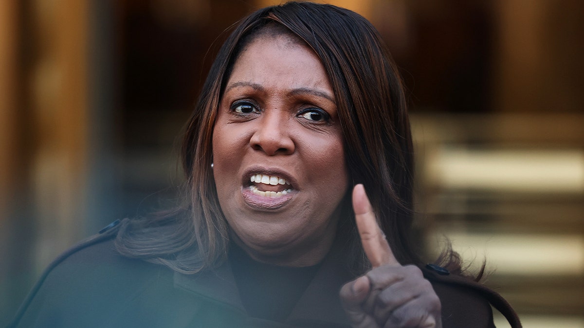 Letitia James angrily gestures and points finger