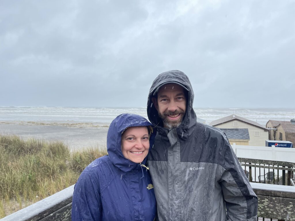 James and Sunny Shorey pose for a picture in Atlantic City while wearing rain coats during a nor'easter