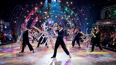 The Strictly Come Dancing pro dancers perform in the ballroom with the pairs performing lifts