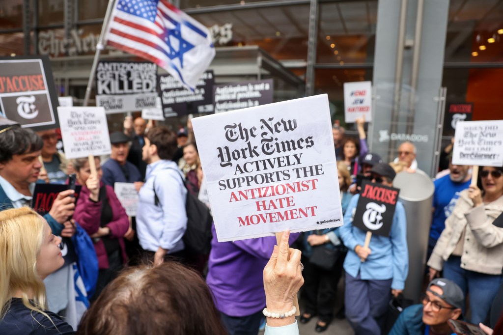 Pro-Israel demonstrators protest a New York Times op-ed story in front of the New York Times headquarters.