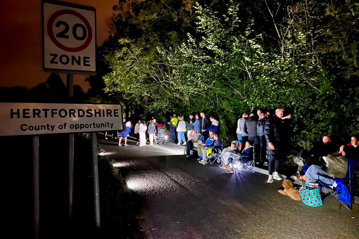 Hundreds of villagers turn up with camp chairs to stop unauthorised work