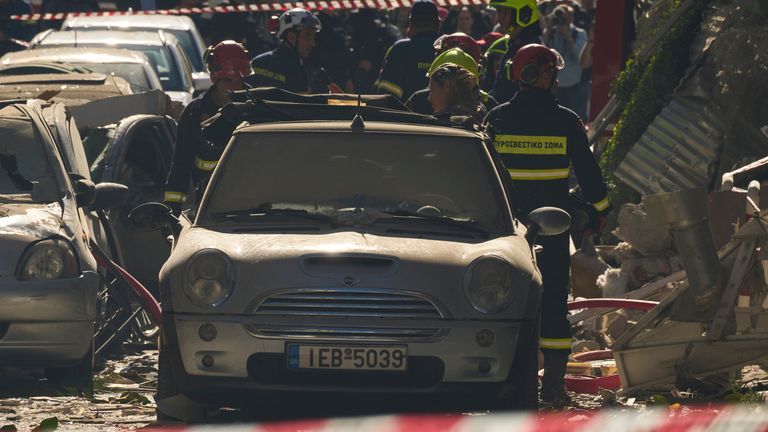 Firefighters at the scene in Athens' Plaka district. Pic: AP