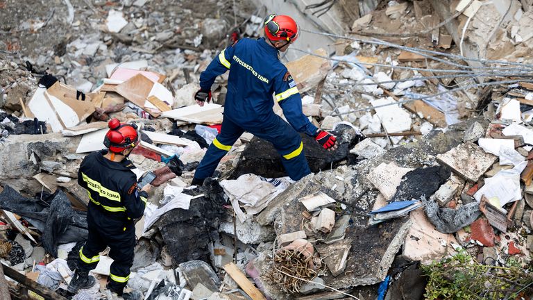 Firefighters in Athens' Plaka district. Pic: AP