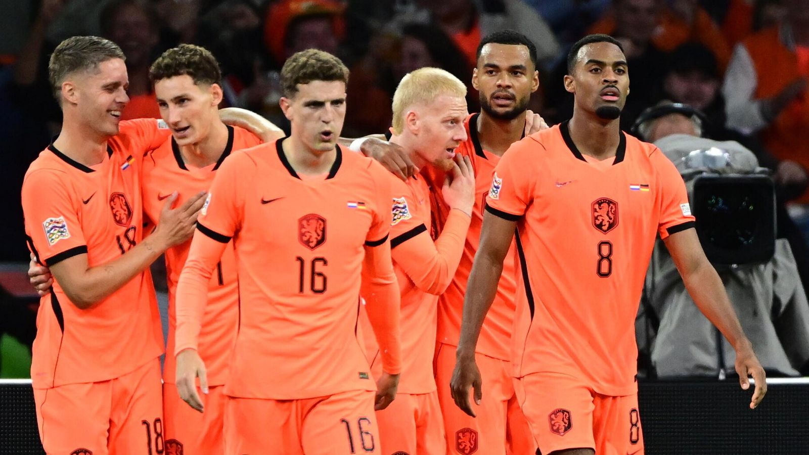 Dutch players celebrate after scoring during the UEFA Nations League soccer match