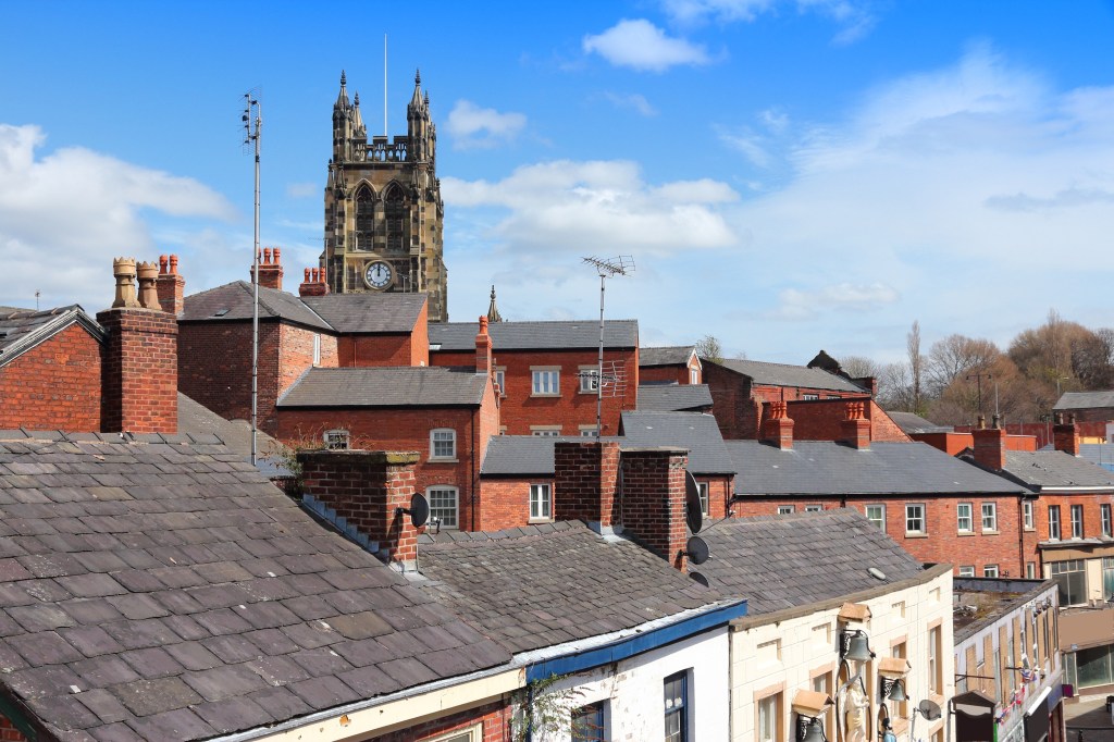 Stockport town skyline with a church tower.