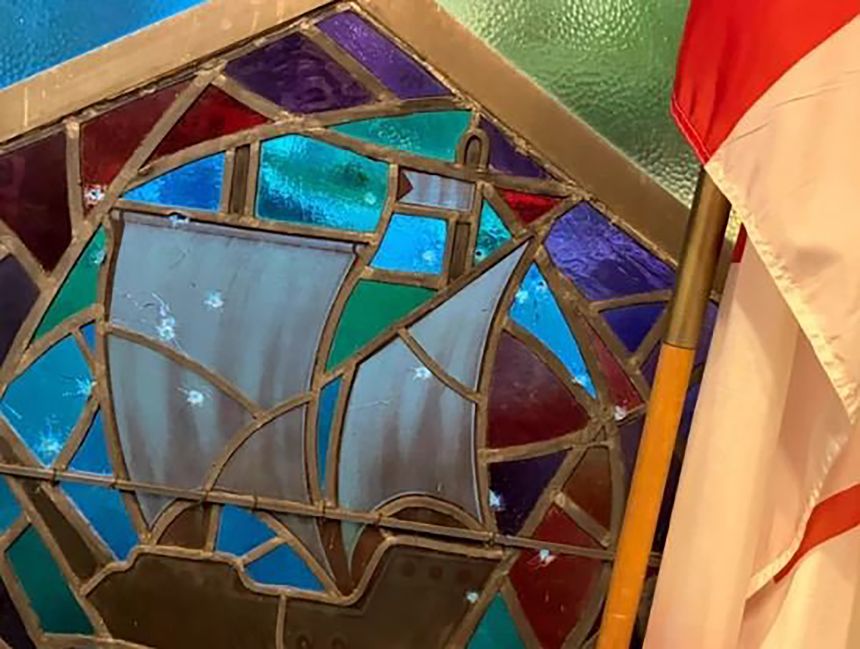 An image shared on social media shows damage from gunfire in the window of the Sons of Jacob synagogue in Belleville, Ontario.
