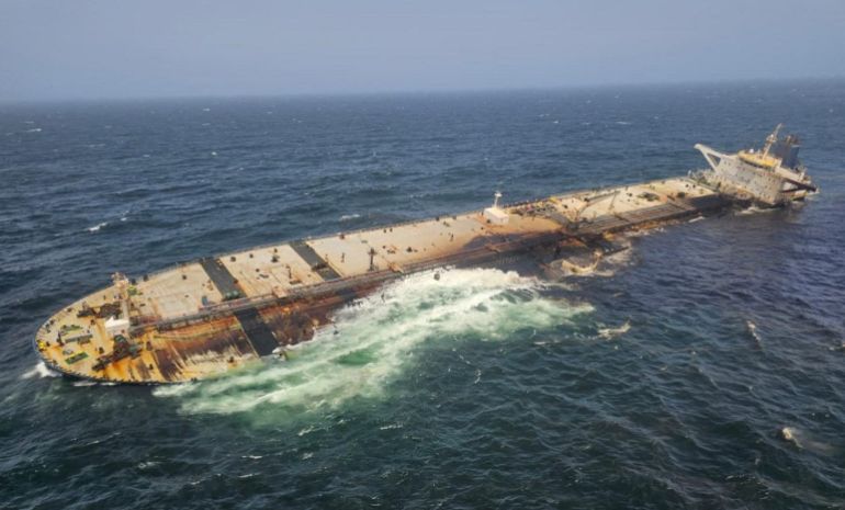 The damaged and half sunk oil tanker Caroline Bezengi, at sea off the coast of Oman, on a date given as August 6, 2026 [File: Ambrey/Handout via Reuters]