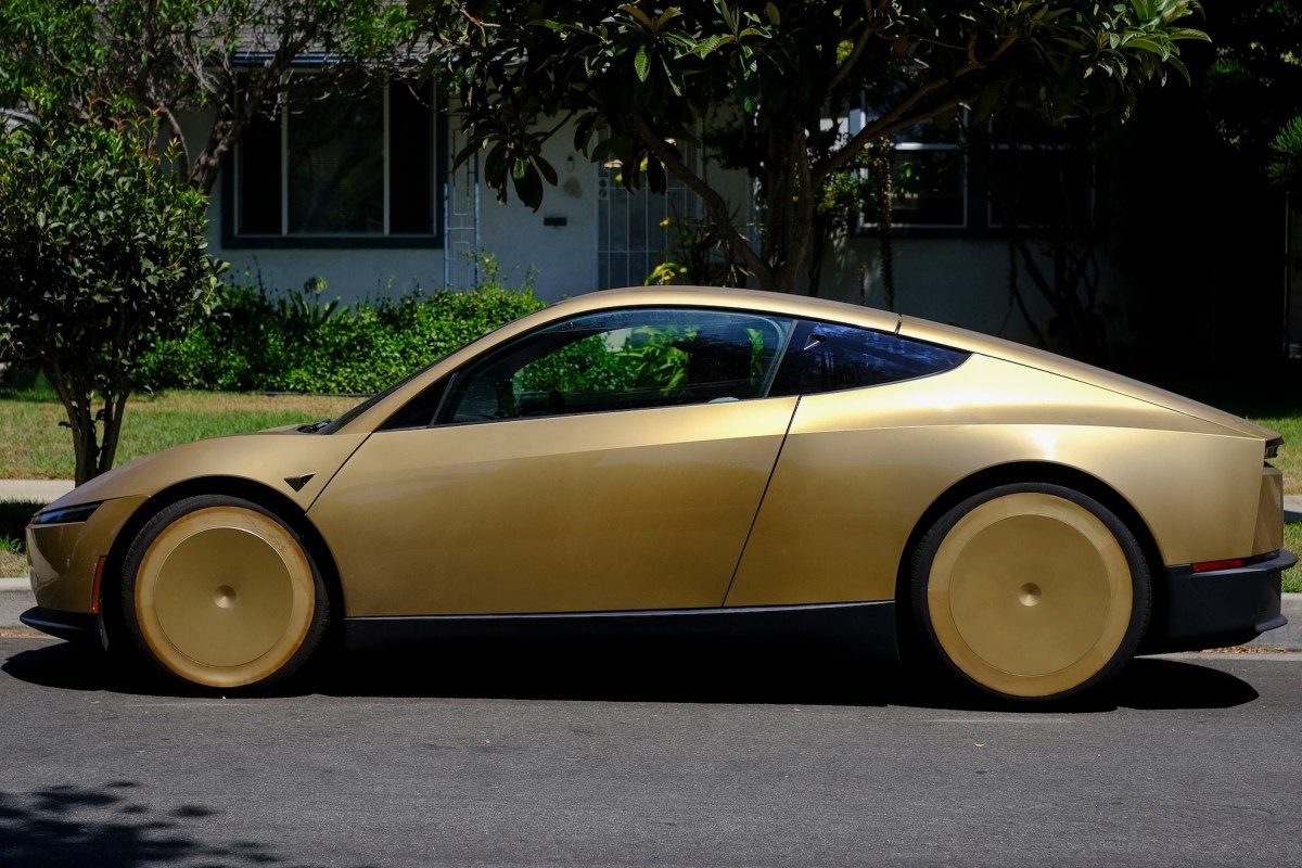 A gold Tesla Cybercab