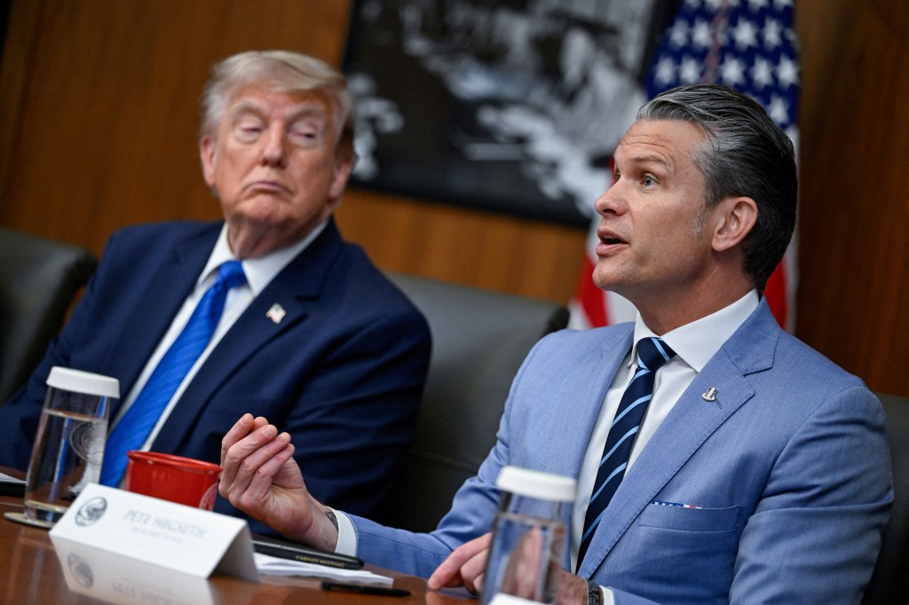 Pete Hegseth speaking at a cabinet meeting with Donald Trump listening.