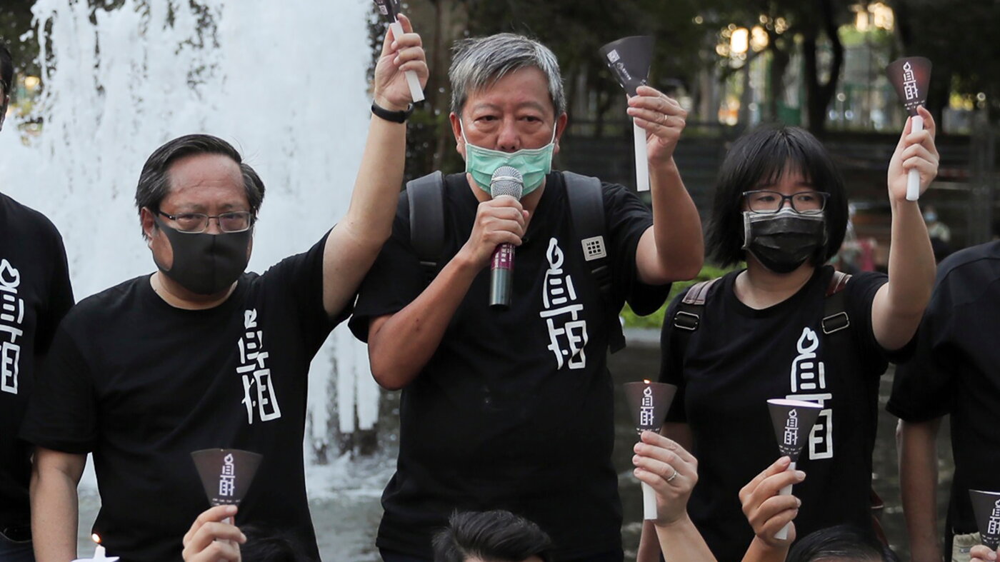 Hong Kong court sentences 3 Tiananmen vigil organizers to prison : NPR