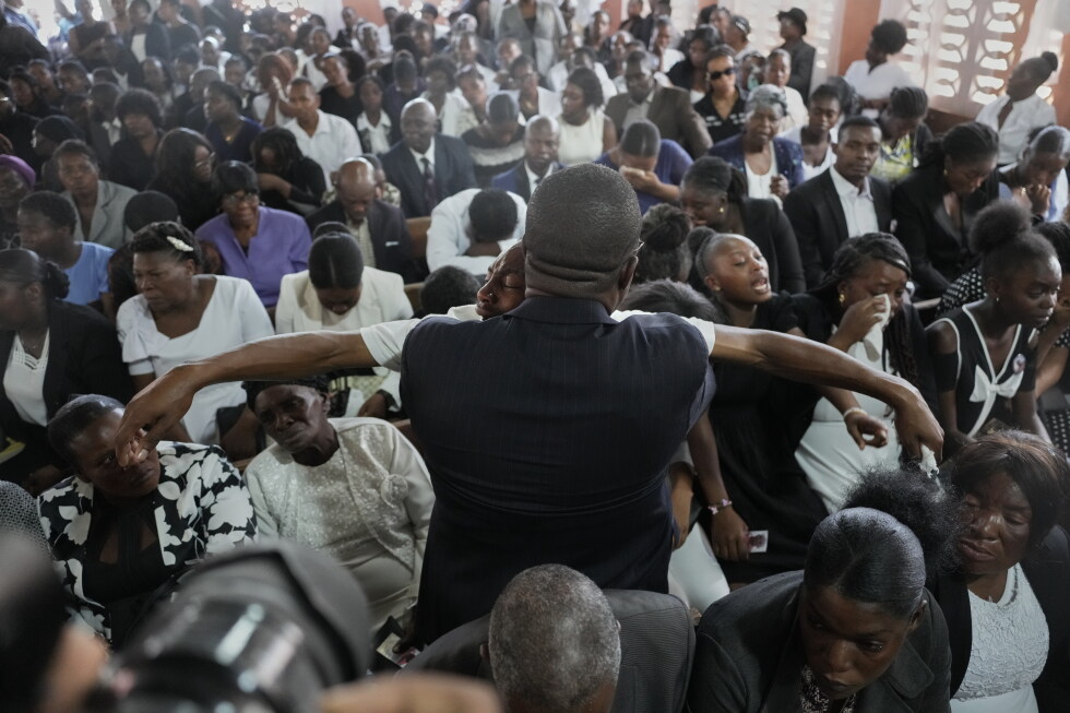 Hundreds mourn 4 victims of brutal Haiti gang attack that killed 47