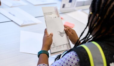 Mail ballots start to go to voters as Trump injects uncertainty