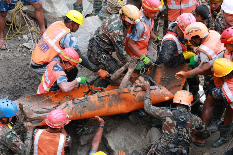 2 trapped workers rescued from tunnel 9 days after Nepal floods