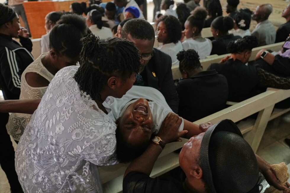 Mourners file into church in Haiti where gangs killed dozens of people