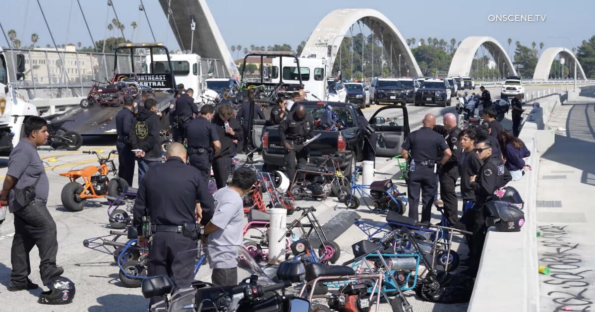 Scores of minibike riders penned in and arrested on 6th Street Bridge
