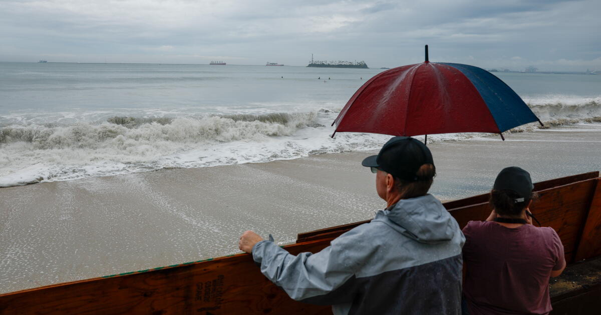 L.A. hit by rare September rain, coastal flooding from Hurricane Marie