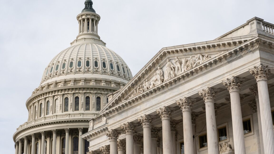 Exterior view of the US Capitol building, including its dome.