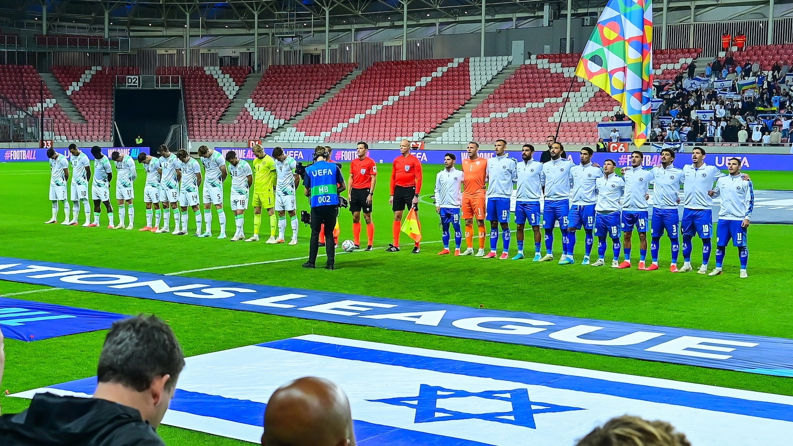 Ireland players wear black armbands and refrain from handshakes in soccer game against Israel
