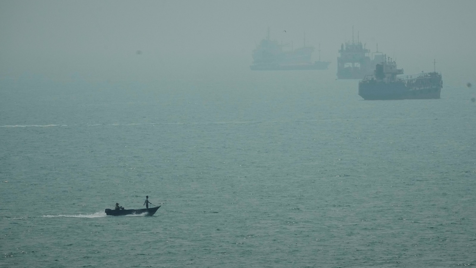 An Iranian commercial ship is struck near Strait of Hormuz with 1 dead, Iranian media say