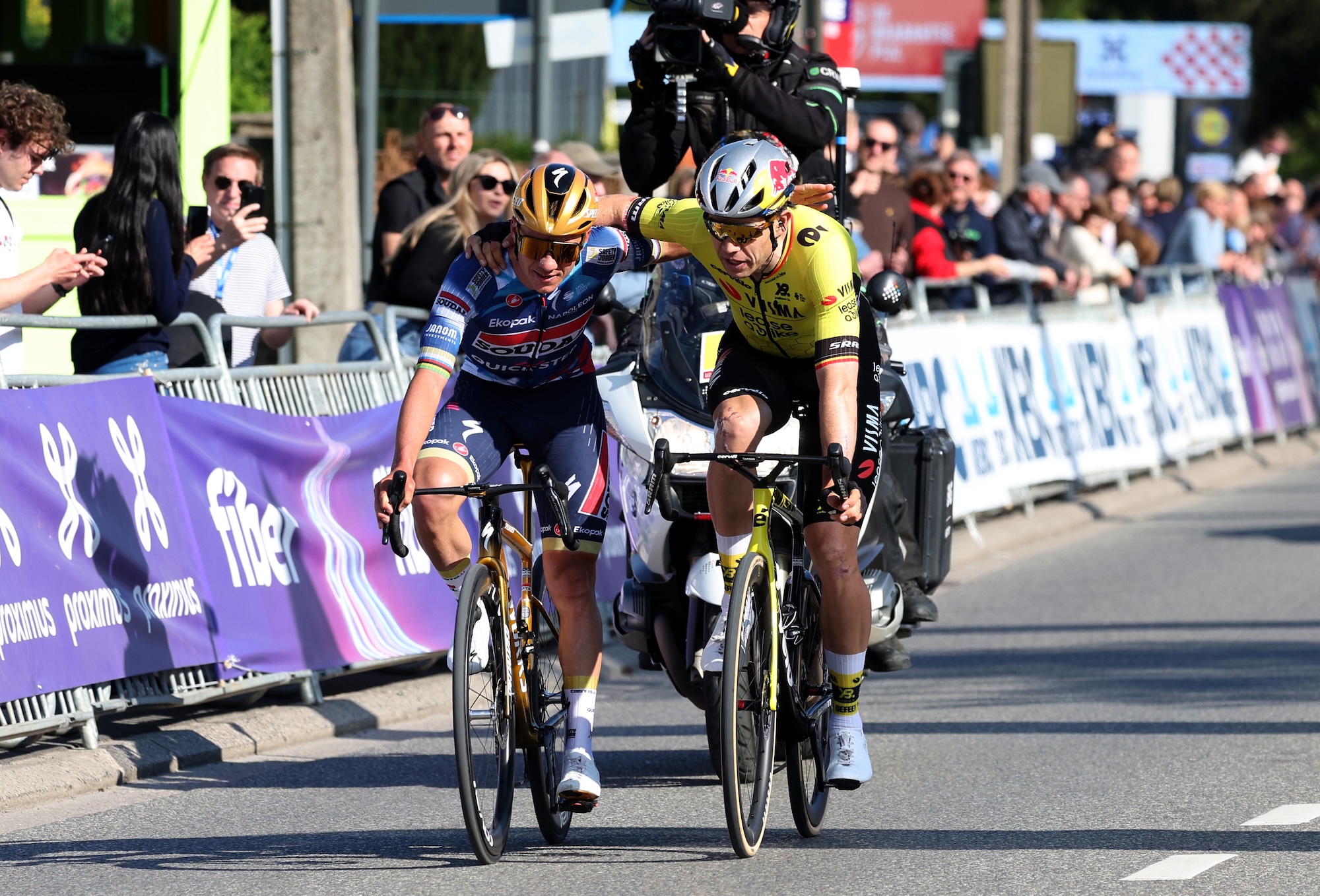 OVERIJSE, BELGIUM - APRIL 18: Race winner Remco Evenepoel of Belgium and Team Soudal Quick-Step and Wout Van Aert of Belgium and Team Visma-Lease a Bike on second place react after the 65th De Brabantse Pijl - La Fleche Brabanconne 2025 - Men's Elite a 162.6km one day race from Beersel to Overijse on April 18, 2025 in Overijse, Belgium. (Photo by Rhode Van Elsen/Getty Images)