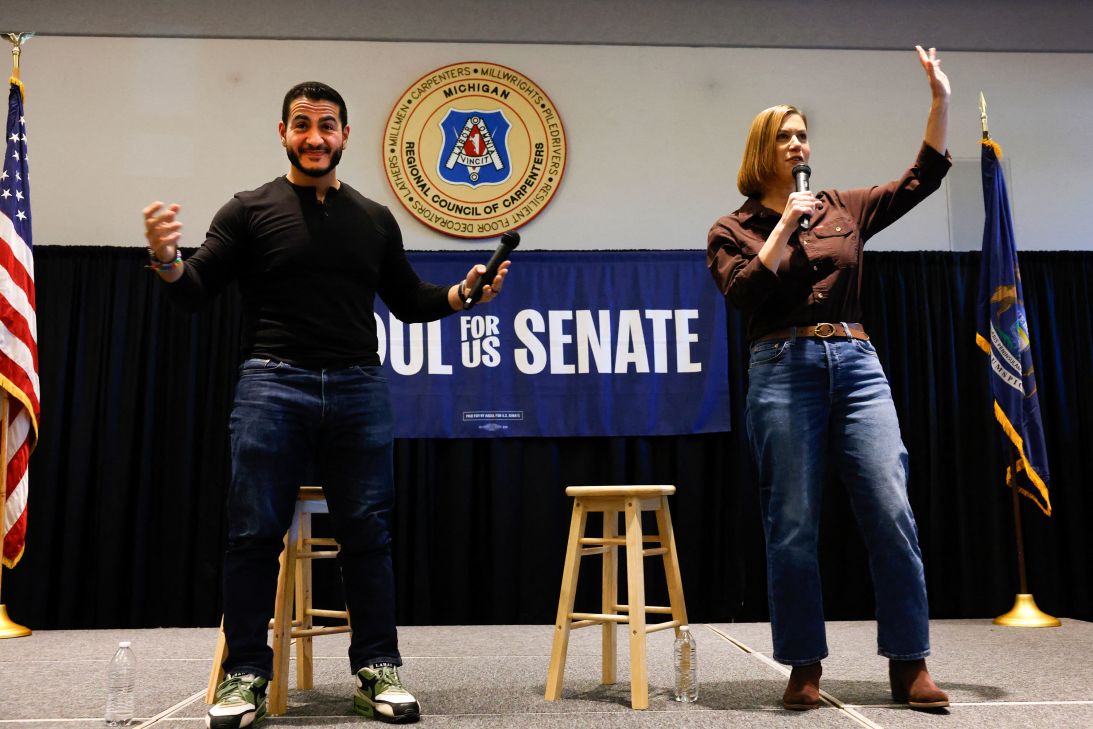 El-Sayed reacts as Sen. Elissa Slotkin speaks during a town hall campaign event in Warren, Michigan, on October 3.