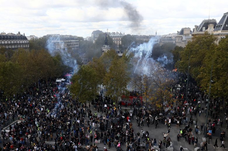General view of the Place de la Republique as protesters walk through tear gas during a demonstration at the Place de la Republique in Paris on Saturday, October 17, 2026.