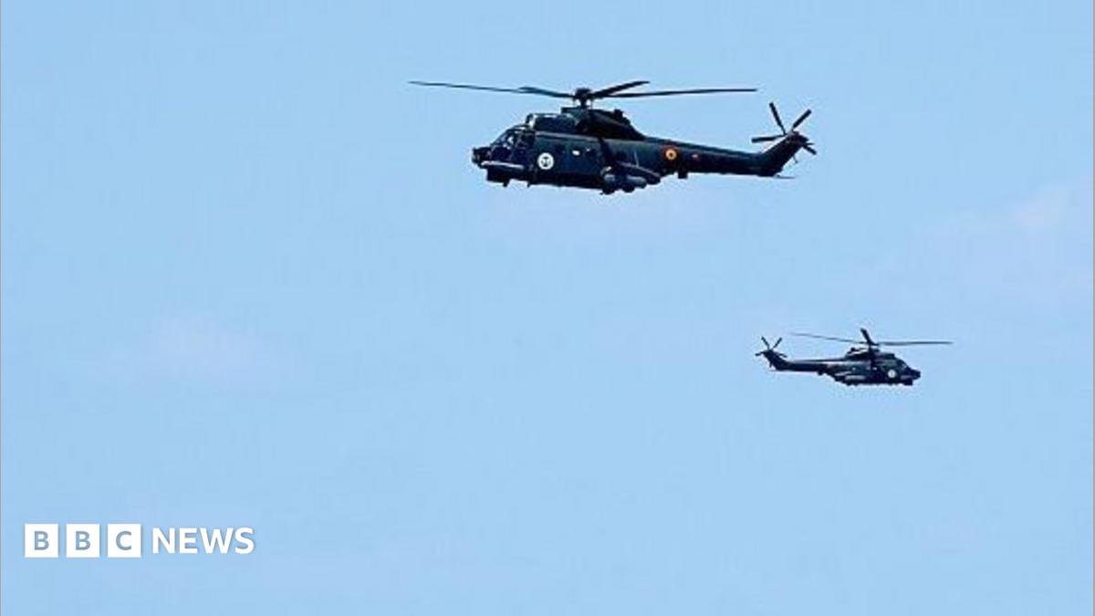 Two Romanian helicopters fly over the Black Sea. File photo