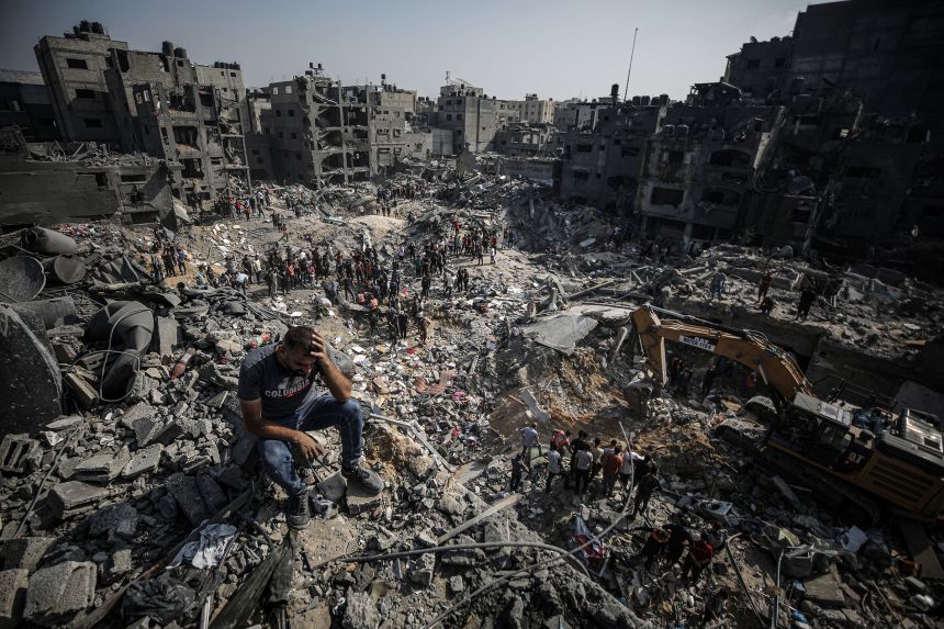 Palestinians conduct a search and rescue operation after an Israeli bombardment at Jabalia refugee camp in Gaza City on November 1, 2023.