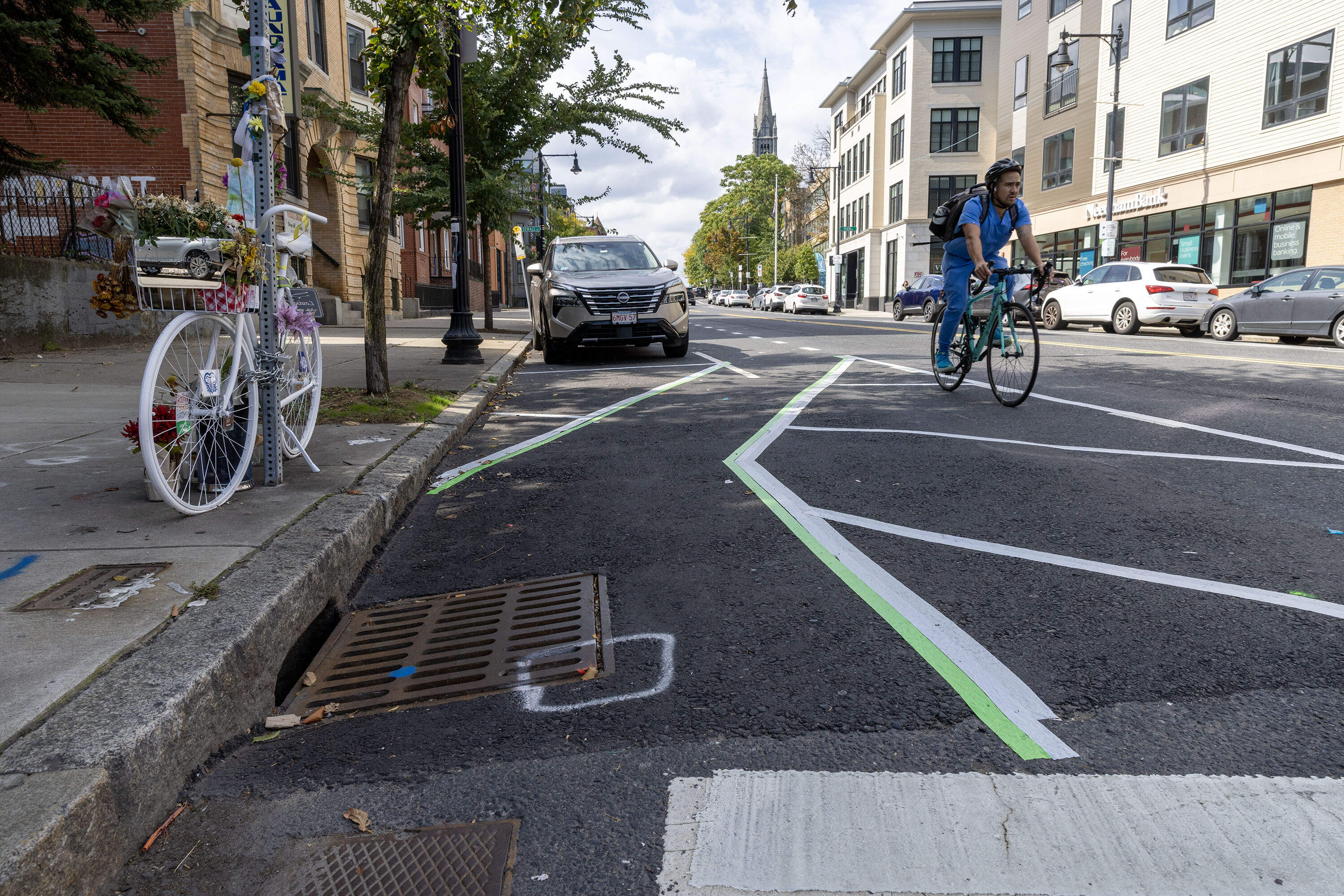 An unofficial bike lane created months after Louisa Gag's death using green and white tape on the corner of Tremont Street and Parker Street in Boston, Mass. (Robin Lubbock/WBUR)