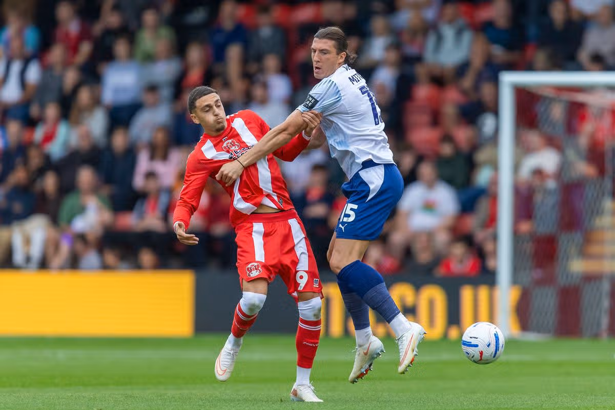 Jaze Kabia of Leyton Orient and Alex Mitchell of Plymouth Argyle battle for the ball during the Sky Bet League One match between Leyton Orient and Plymouth Argyle at BetWright Stadium on October 3, 2026 in London, England. (Photo by MB Media/Getty Images)