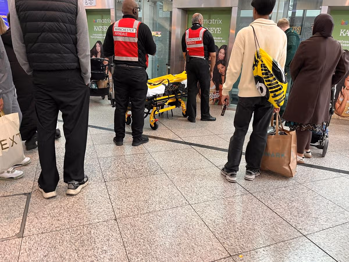 A stretcher being taken up a lift in the Arndale