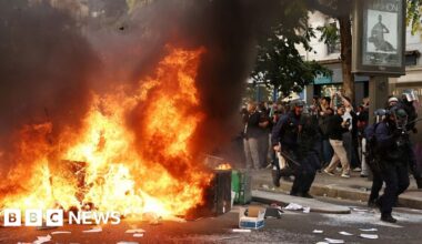 France halts use of stun grenades after boy's hand blown off in student protests - BBC