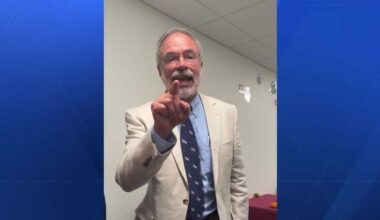 Harris clashes with forum audience, threatens reporter's removal