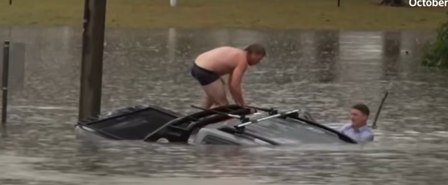 TV Reporter, Bystander Save Man From Sinking Car