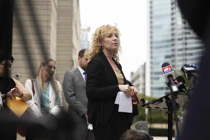 Kate Lincoln-Goldfinch, Wilber Garces Perez’s attorney, speaks after a hearing at a federal courthouse in Austin, Texas, on September 30, 2026. Lorianne Willett/KUT News