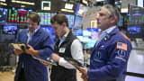 Traders work on the floor of the New York Stock Exchange (NYSE) during morning trading on Aug. 24, 2026 in New York City.
