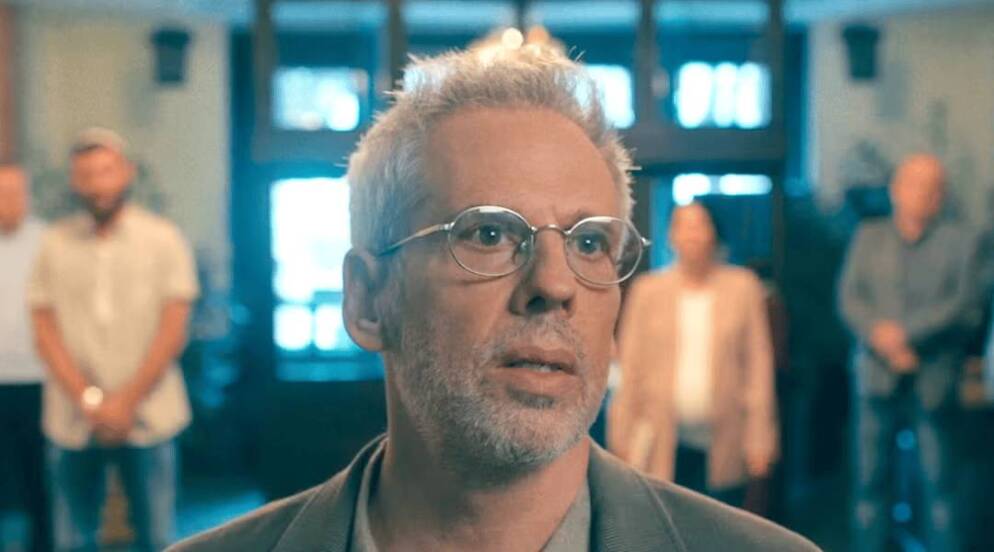 Josh Pais stars as an American-born, former Mossad agent in the dark Israeli comedy “Checkout.”