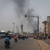 Black smoke rises above Bamako near the Africa Tower on April 26, 2026, a day after coordinated attacks by Tuareg FLA rebels and JNIM militants struck multiple areas across Mali.
